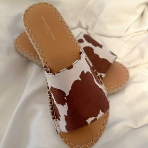 American Eagle Cow Print Slip On Sandals